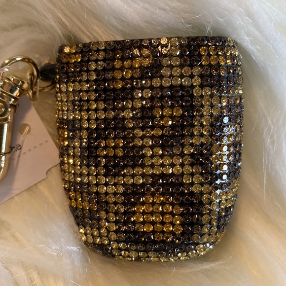 CHEETAH BEAUTIFUL GEMS
Sanitizer Holder Brand New - Picture 3 of 4